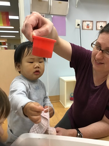 Educator holding object