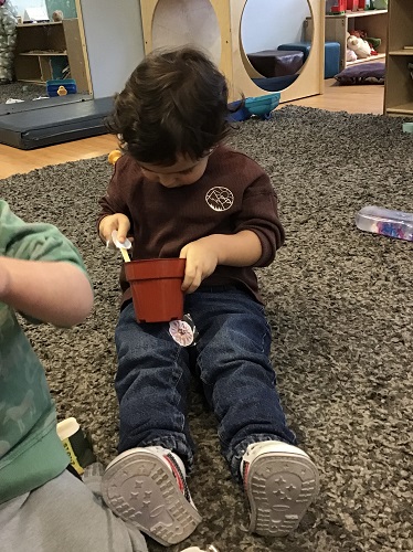 child holding object