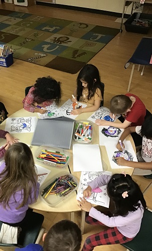 school-age 1 using colouring sheets for their yes day