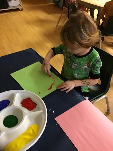 school-age child painting