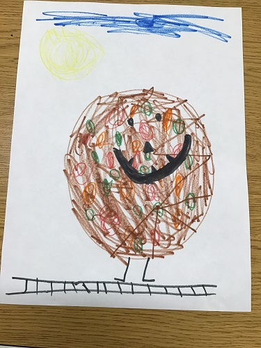 A drawing of a pizza that a child created