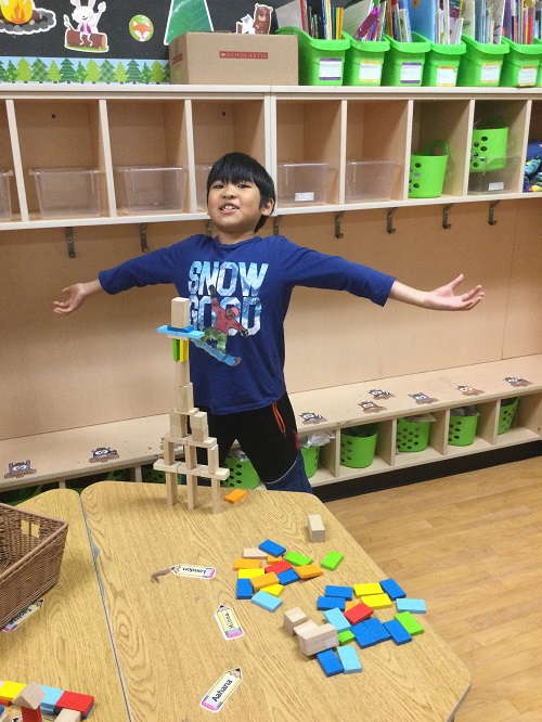 individual child with block tower