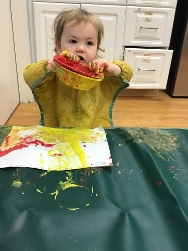 Child playing with paint