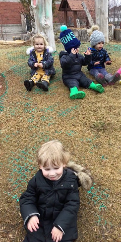 Toddlers singing songs outside on the hill