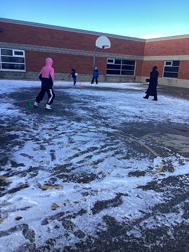 school-age children running the bases