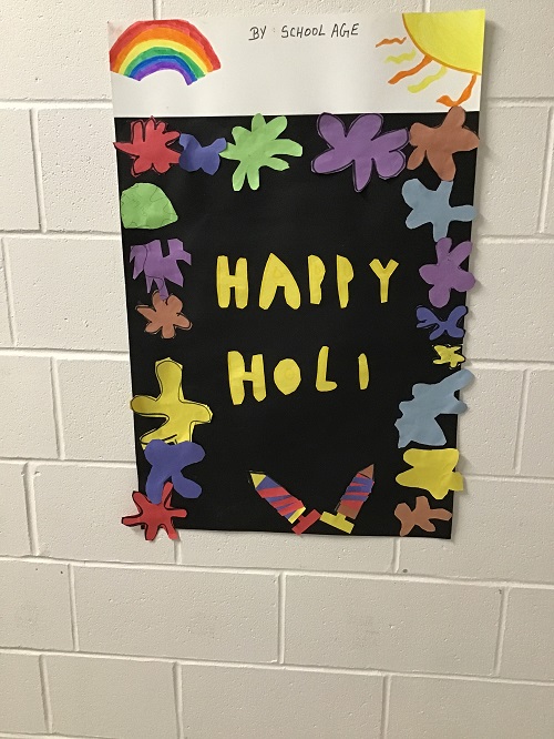A poster that says happy Holi