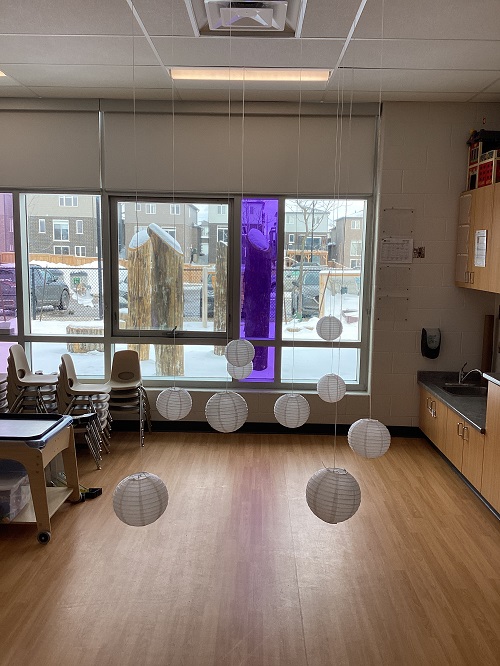 Blank lanterns suspended from the ceiling.