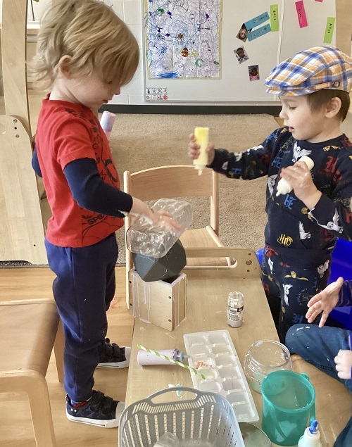 Children exploring with glue