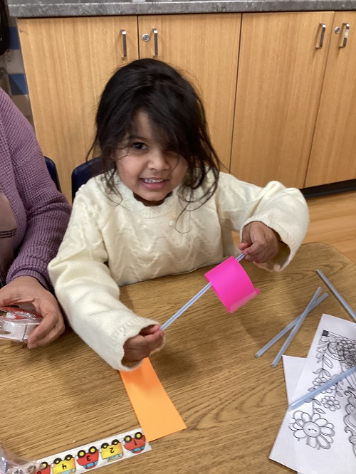 A child creating an airplane.