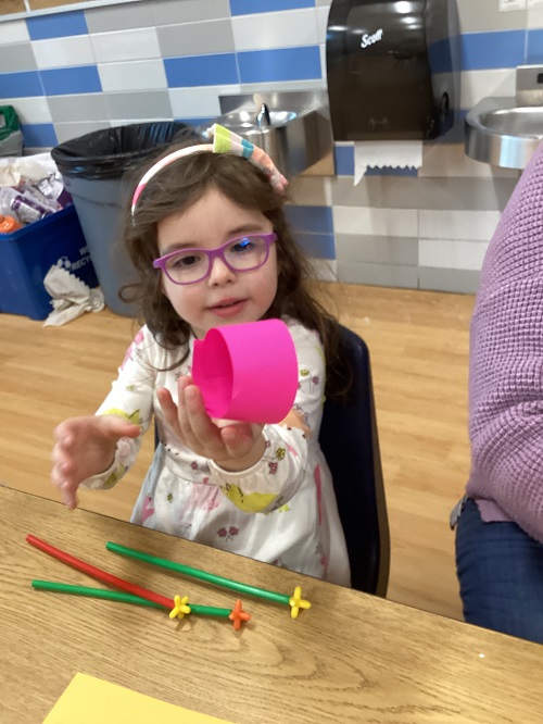 A child creating an airplane.