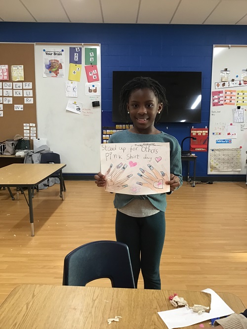 A child's artwork inspired by Pink Shirt Day.