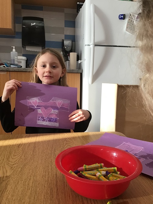 A child's artwork inspired by Pink Shirt Day.