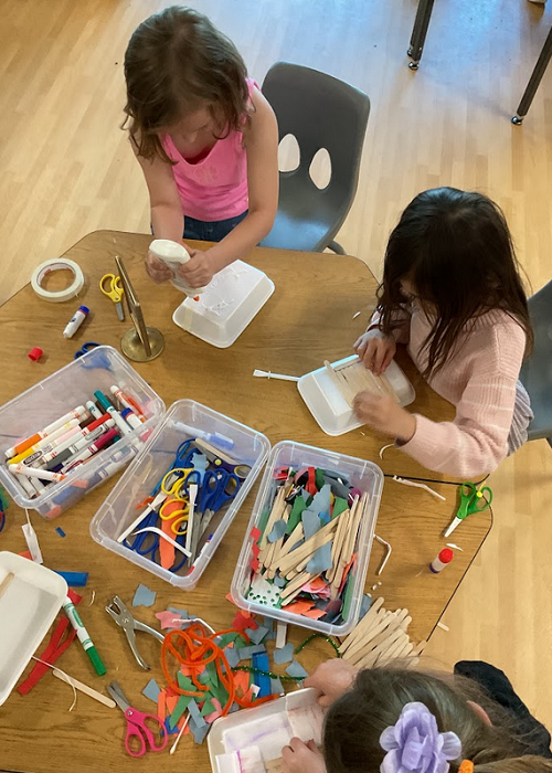 children using loose parts and crafting