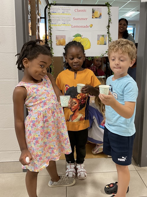 children drinking lemonade
