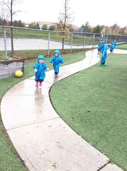 children running in the rain