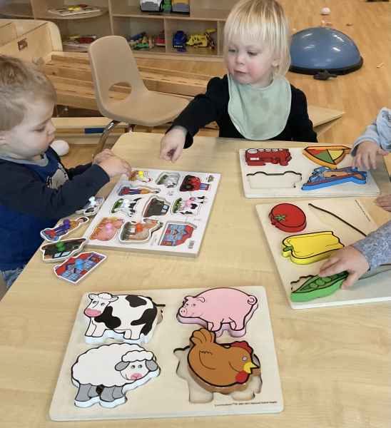 children doing puzzles at risingoaks st.patrick