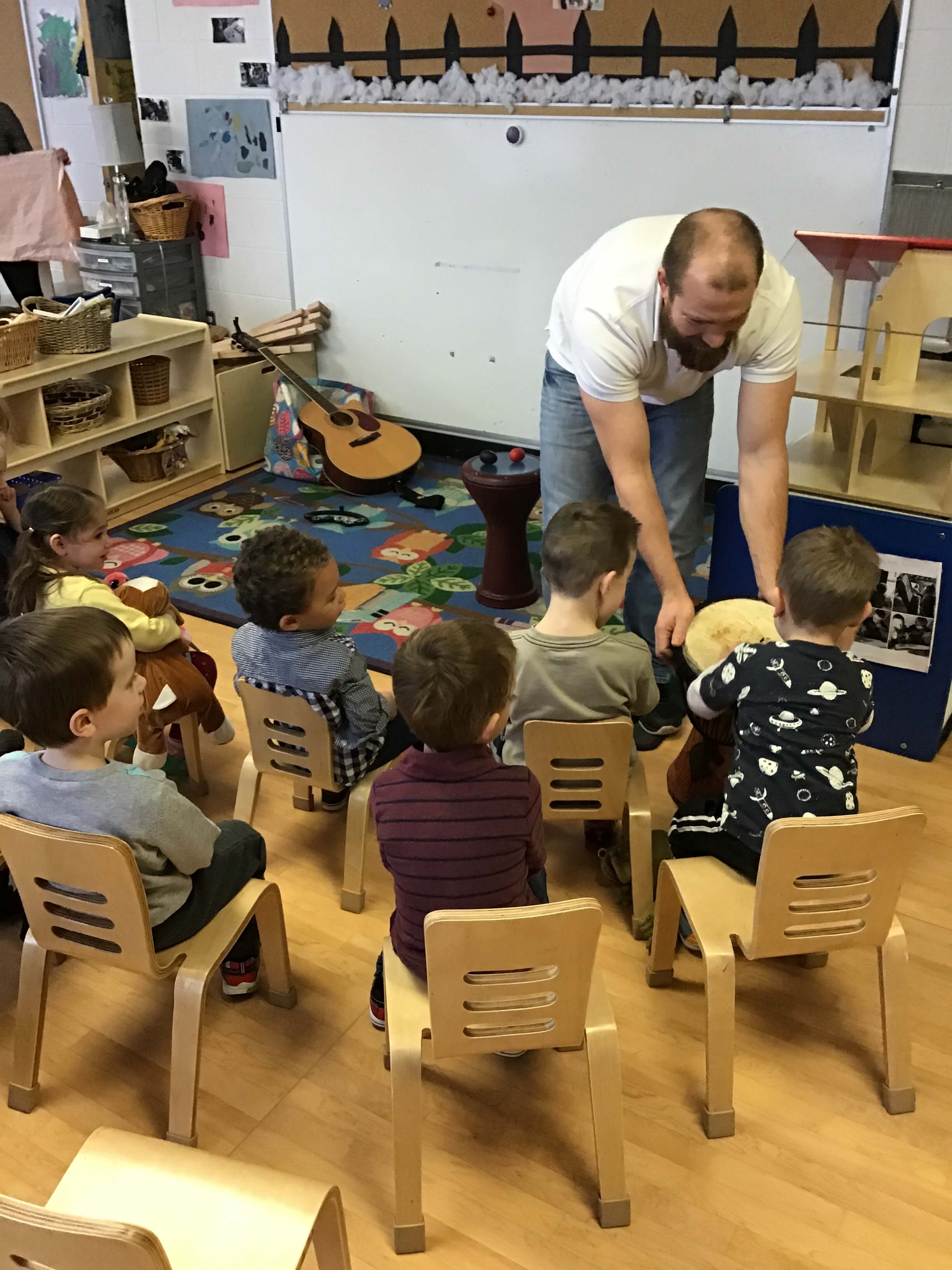 musician teaching children