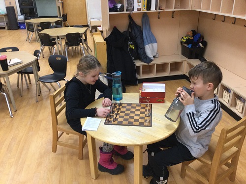 2 Children playing chess