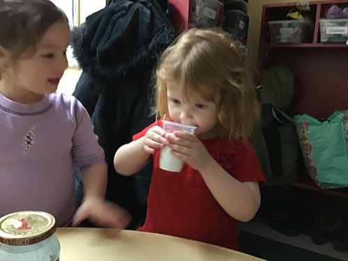 Child using paint brushes