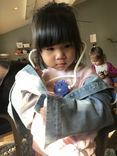 Hazel wearing stethoscope 