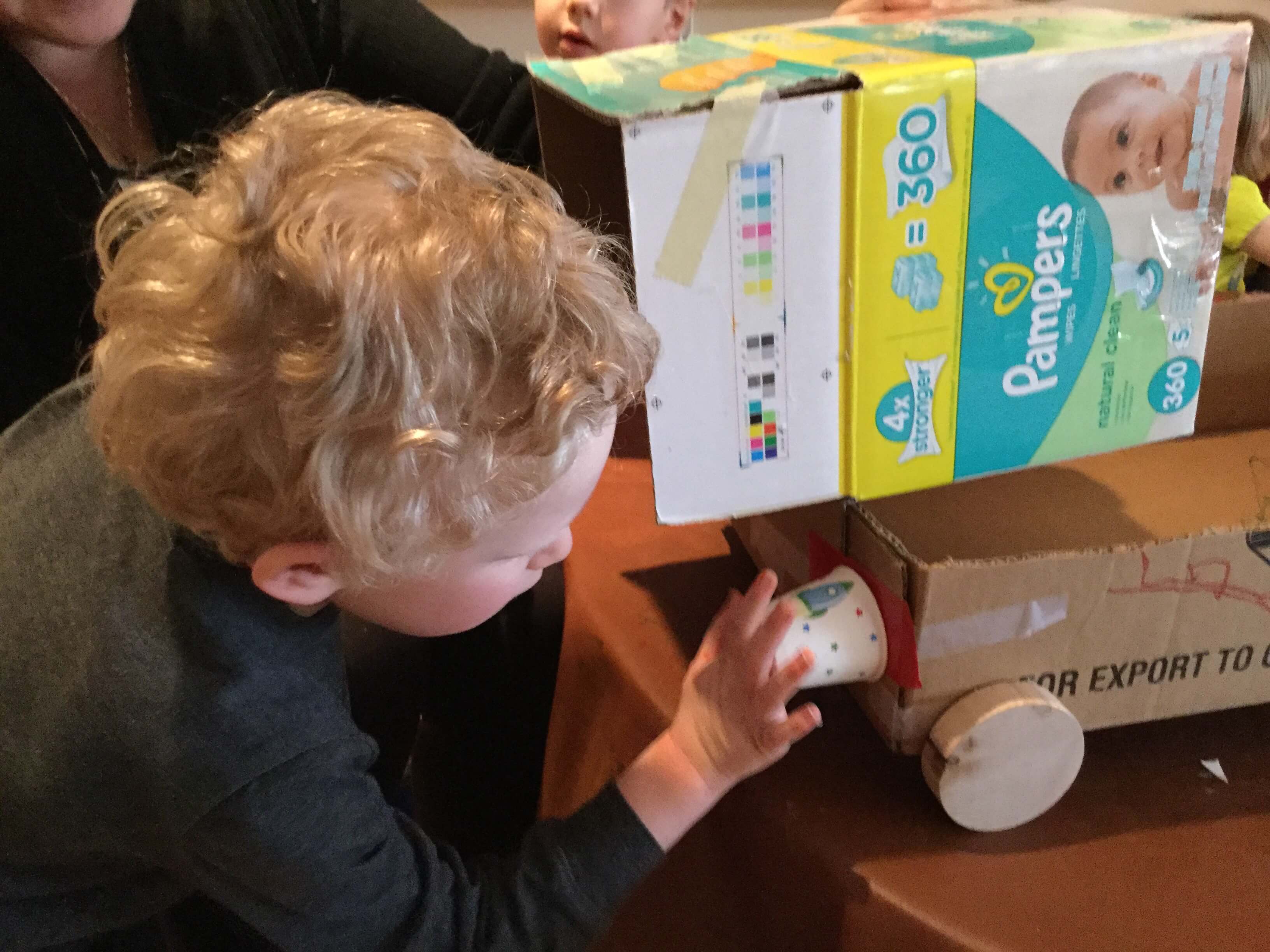 child made vehicle with recycled objects