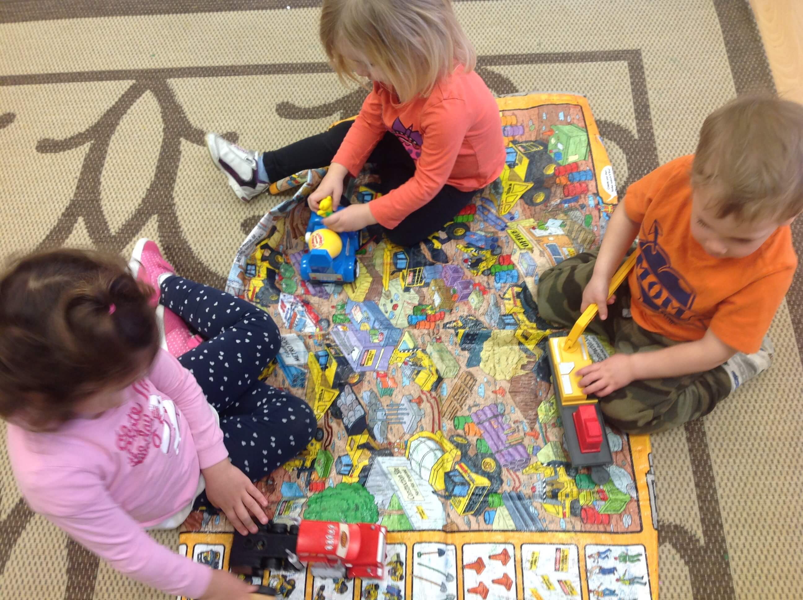 children playing a construction game