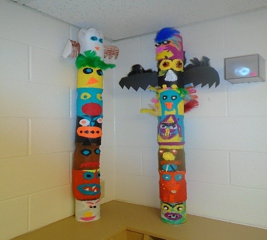 two finished totem poles the children created